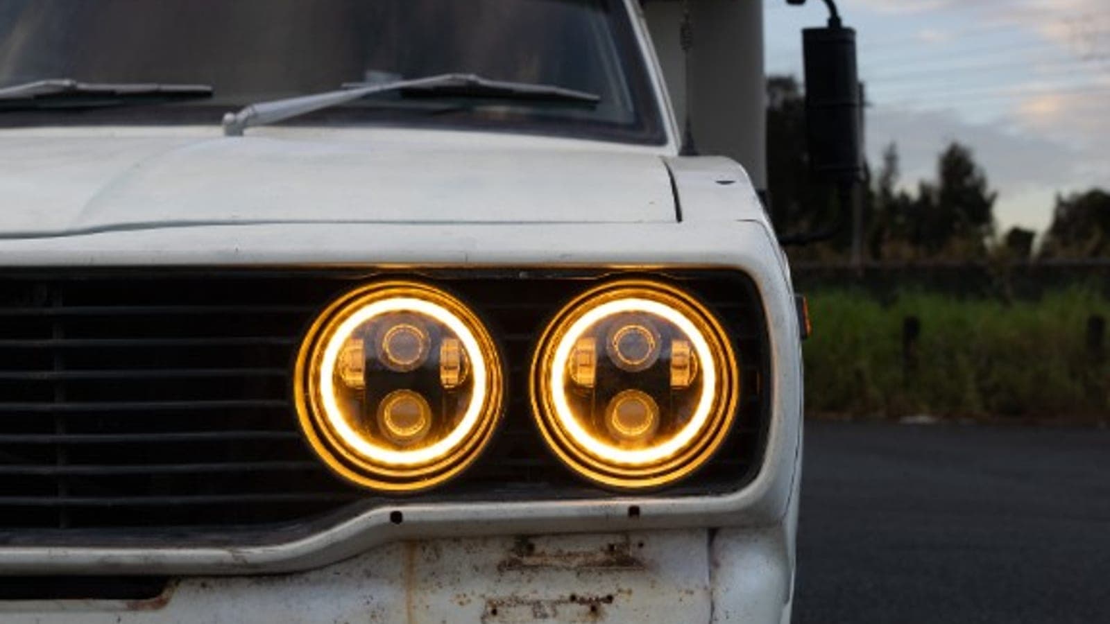 The Chinook's halo LED headlights glowing at dusk